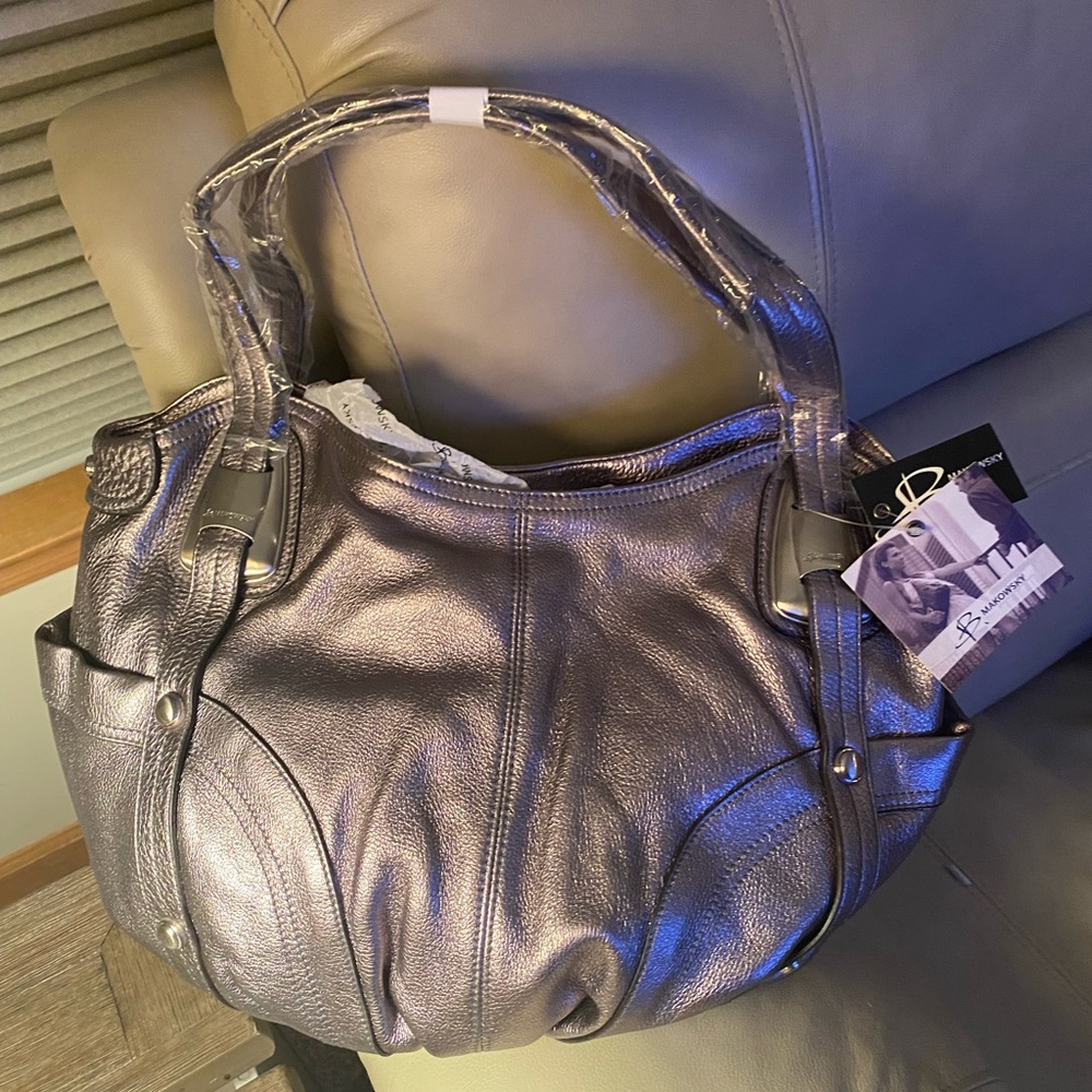 Kathy Van Zeeland handbag! New and unused condition. Gold….